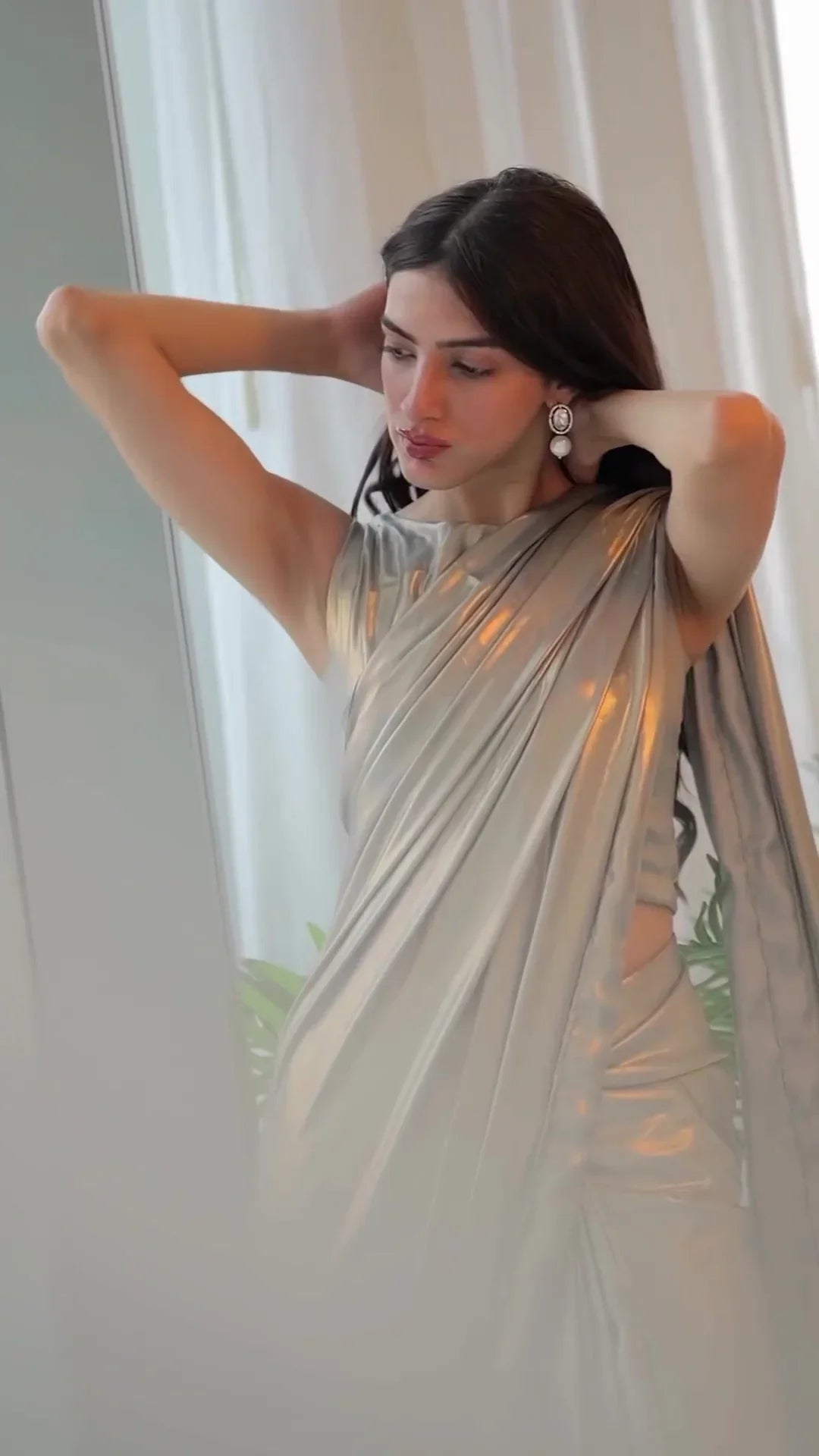 Copper Brilliance! Elevate your glamour with our Metallic Satin Saree, adorned with beads. Limited stock - Indulge in luxe elegance now! 💫✨"